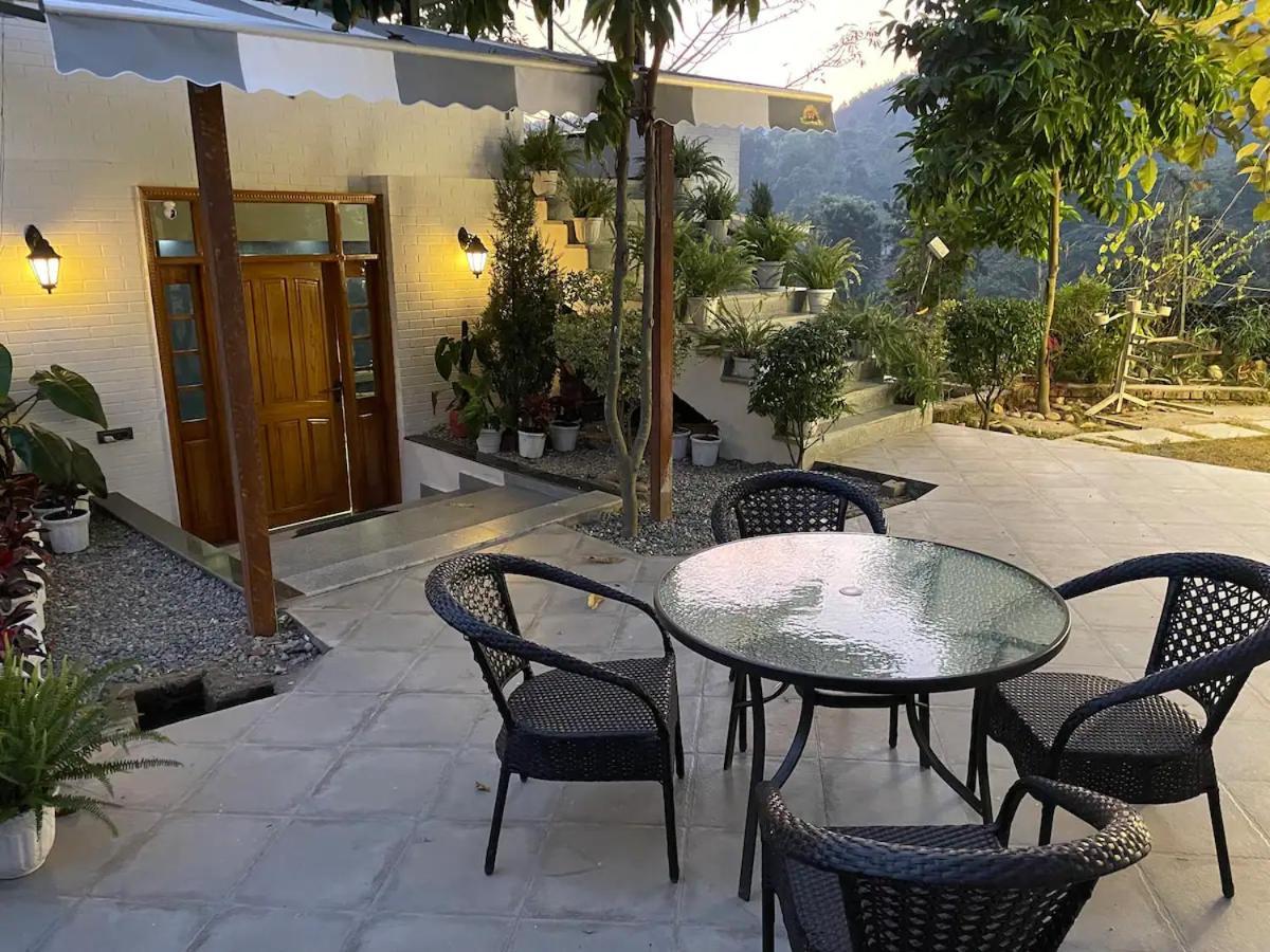 Saraiville- Luxury Riverside Cottages Dehradun Esterno foto